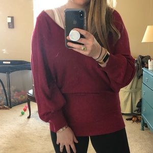 Slouchy red off-the-shoulder sweater